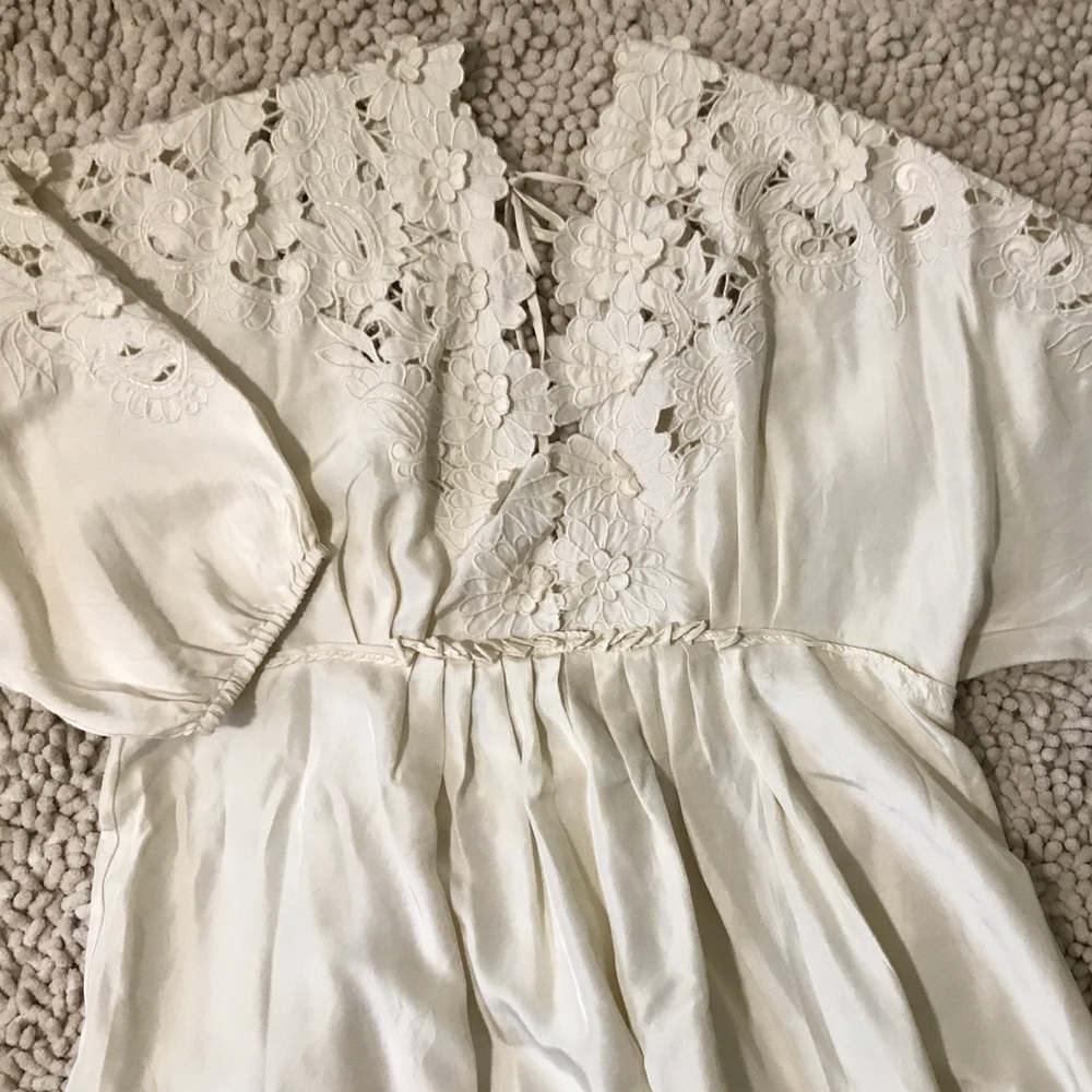 Off-white, knee-length dress